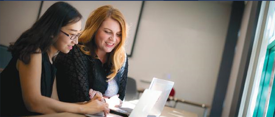 two people at computer